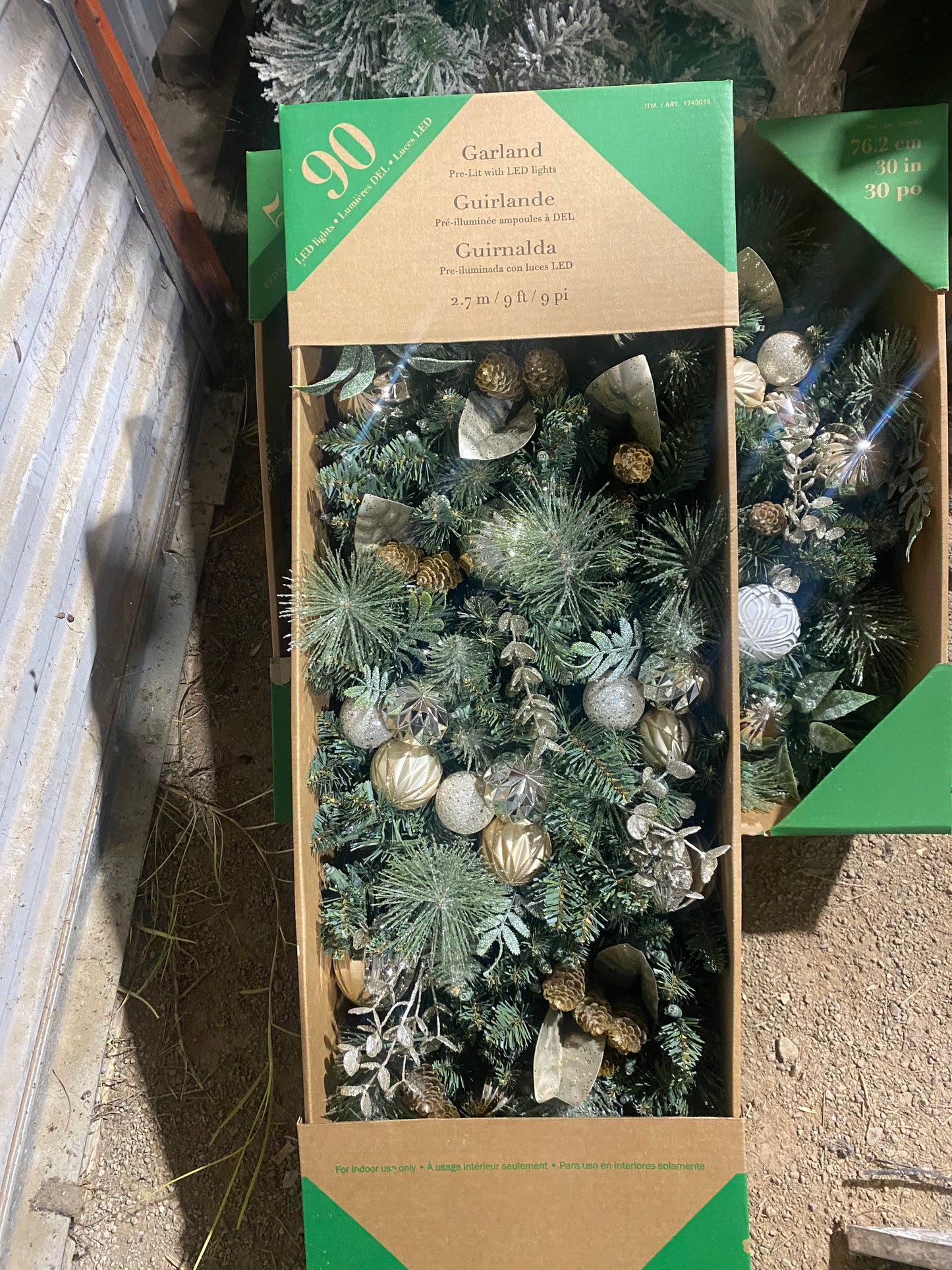 New in box garland. Costco return 9ft. 90 lights
