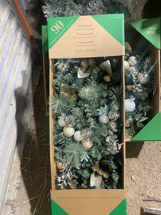 New in box garland. Costco return 9ft. 90 lights